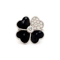 VAN CLEEF & ARPELS, DIAMOND, ONYX AND WHITE GOLD 'COSMOS' RING