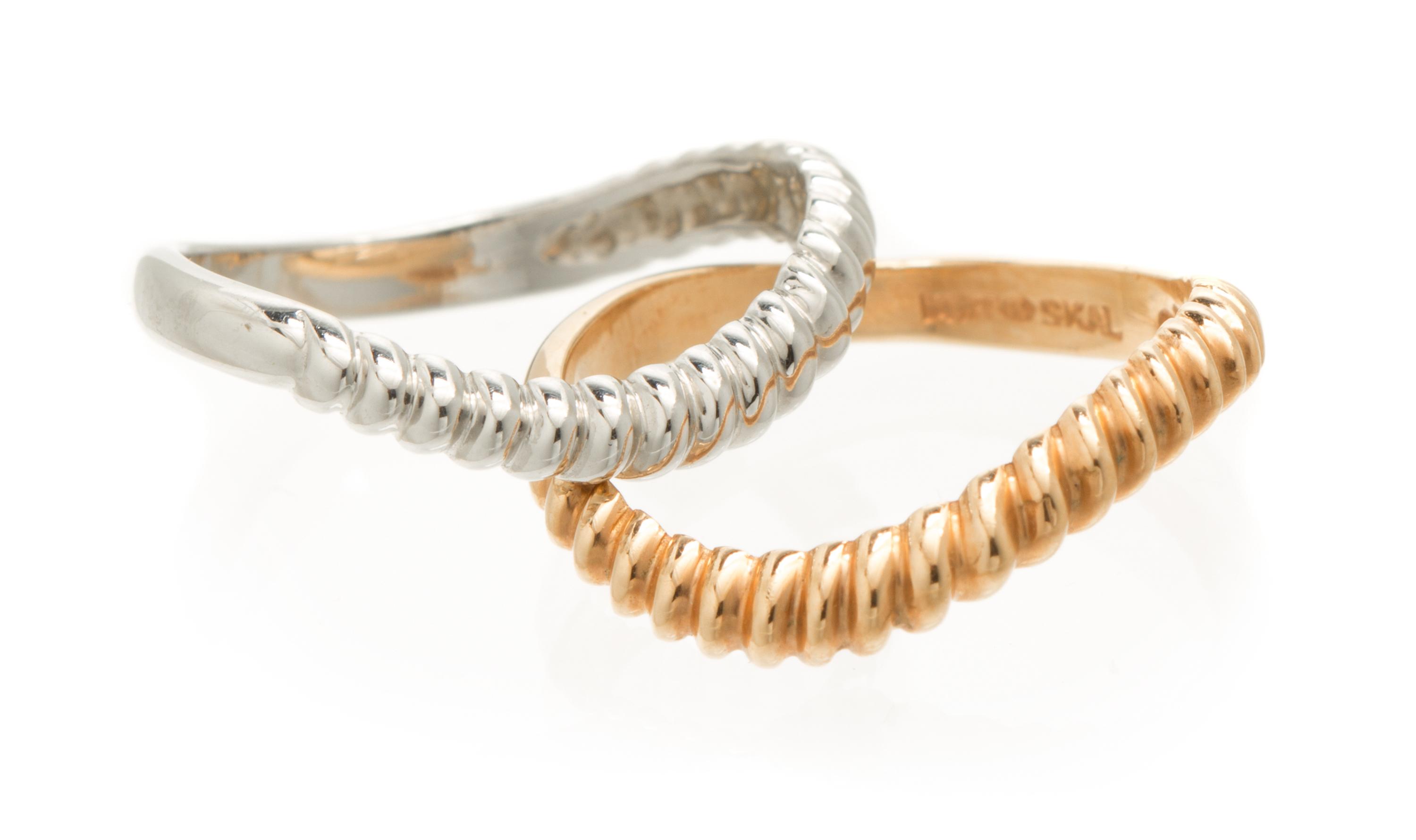 A Pair Of 14 Karat Rose and White Gold Stacking Rings, 3.70 dwts.