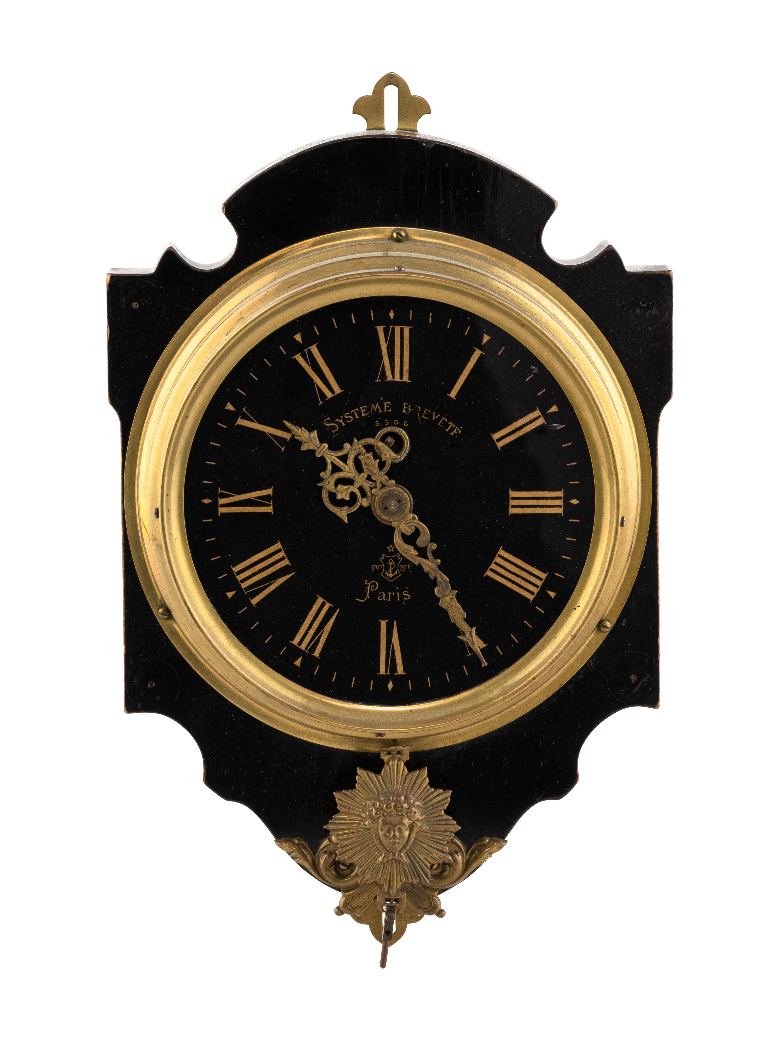 A French Gilt Metal Mounted Ebonized Wall Clock