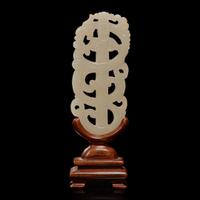 A Chinese white jade "sword" pendant and wood stand 劍形玉飾