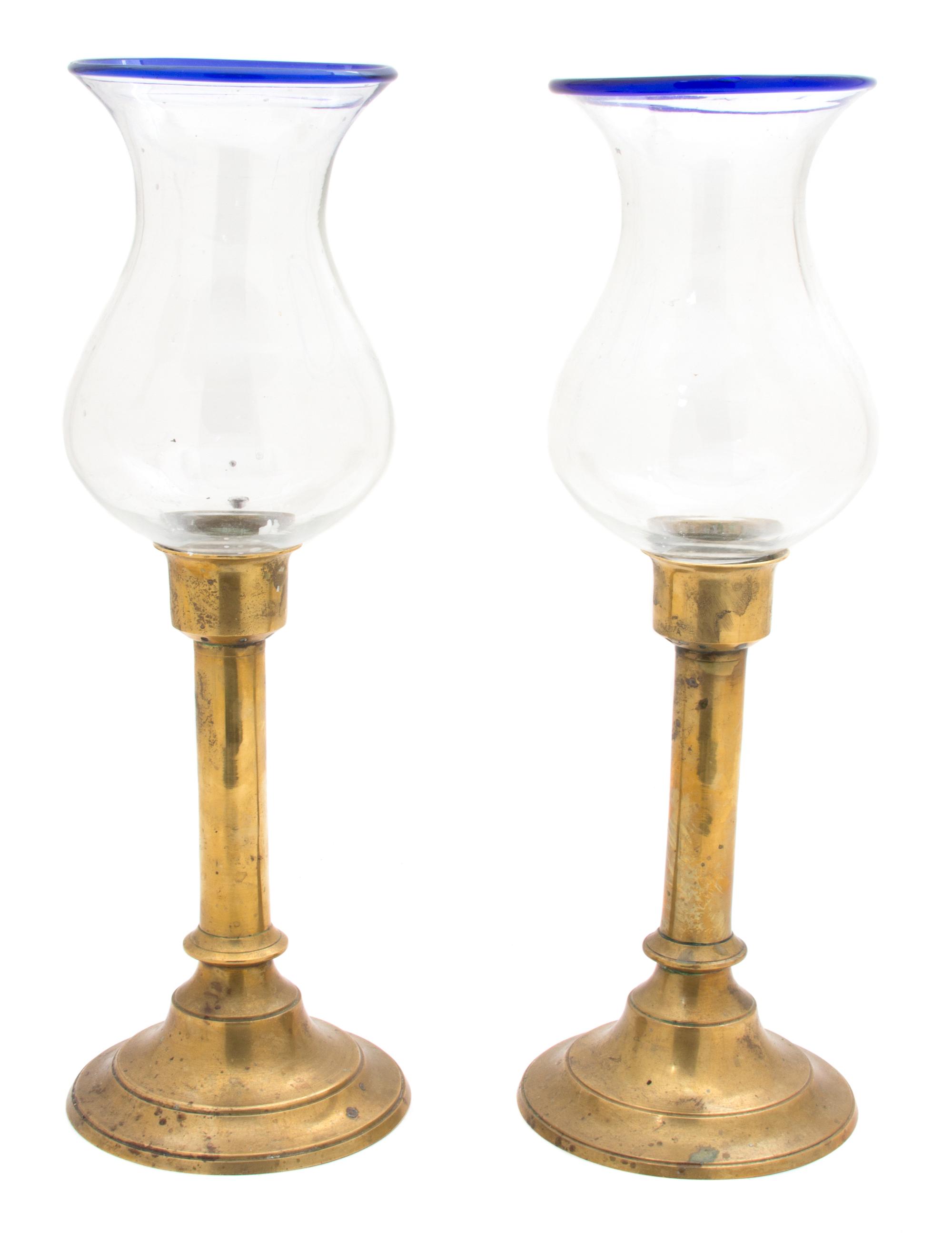 A Pair of American Brass Candlesticks with Blown Glass Hurricane Shades — 19TH CENTURY