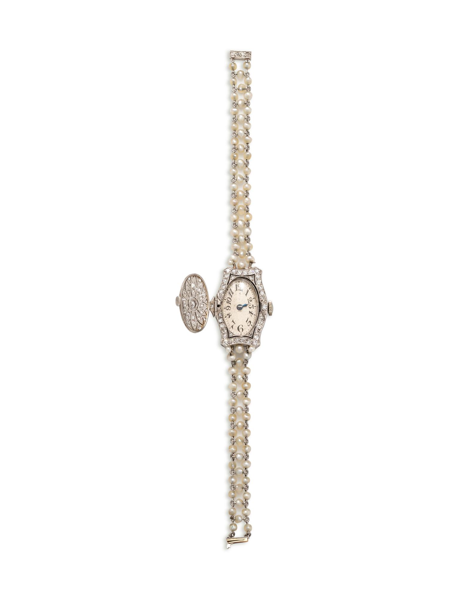 ART DECO, DIAMOND AND SEED PEARL SURPRISE WRISTWATCH