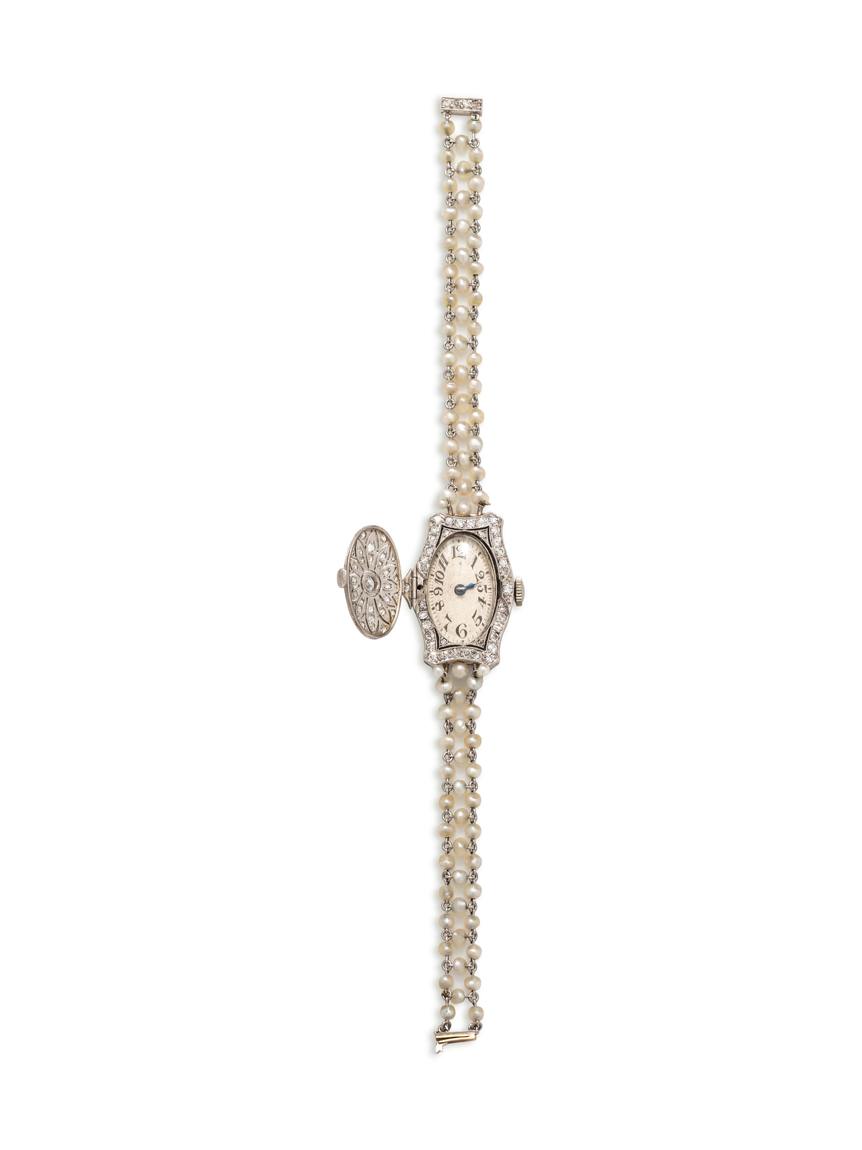 ART DECO, DIAMOND AND SEED PEARL SURPRISE WRISTWATCH