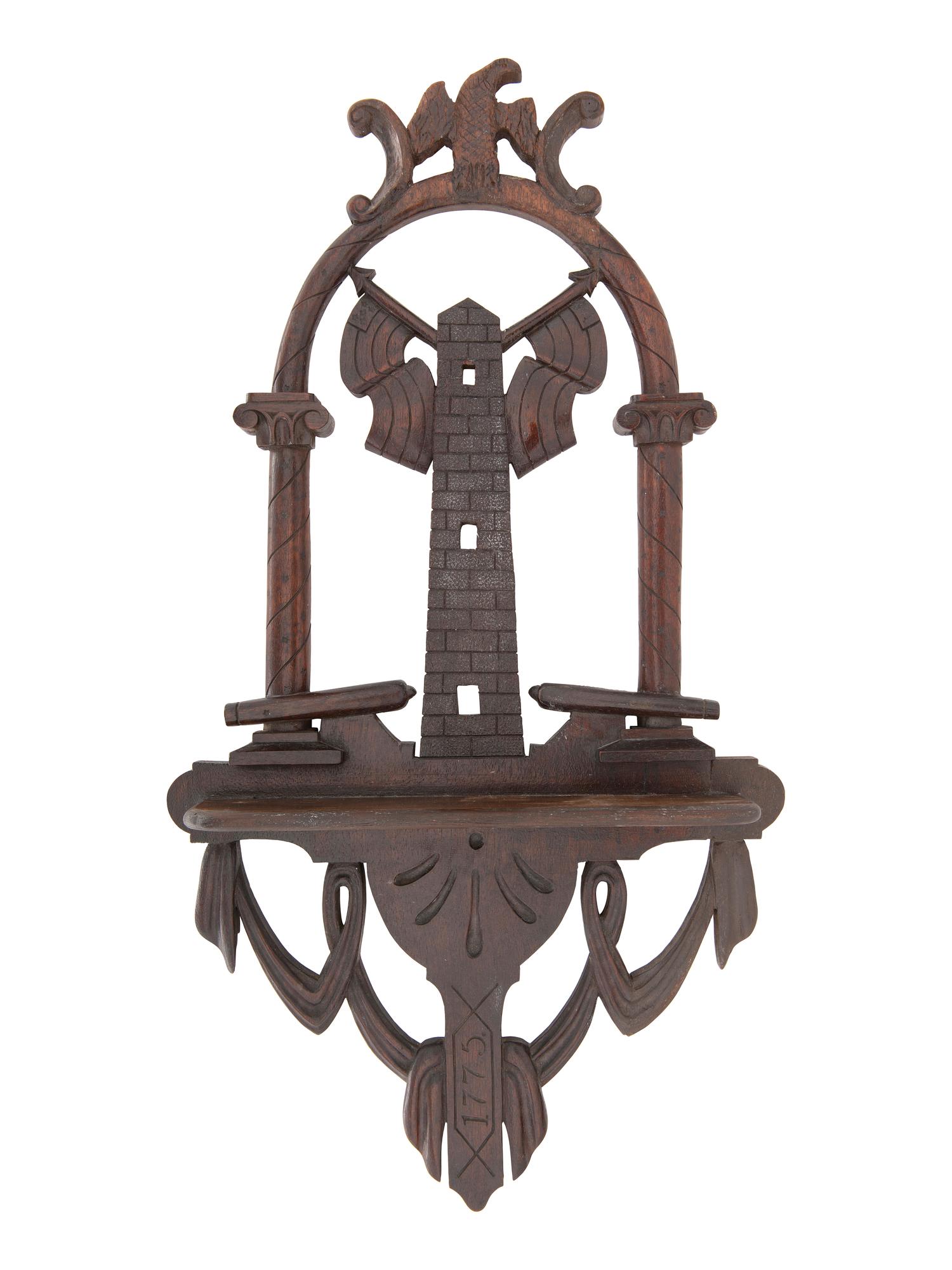 [AMERICANA]. Folk art carved patriotic shelf featuring eagle and cannon.