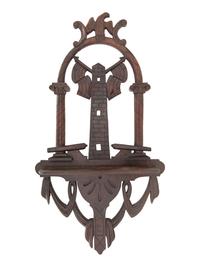 [AMERICANA]. Folk art carved patriotic shelf featuring eagle and cannon.