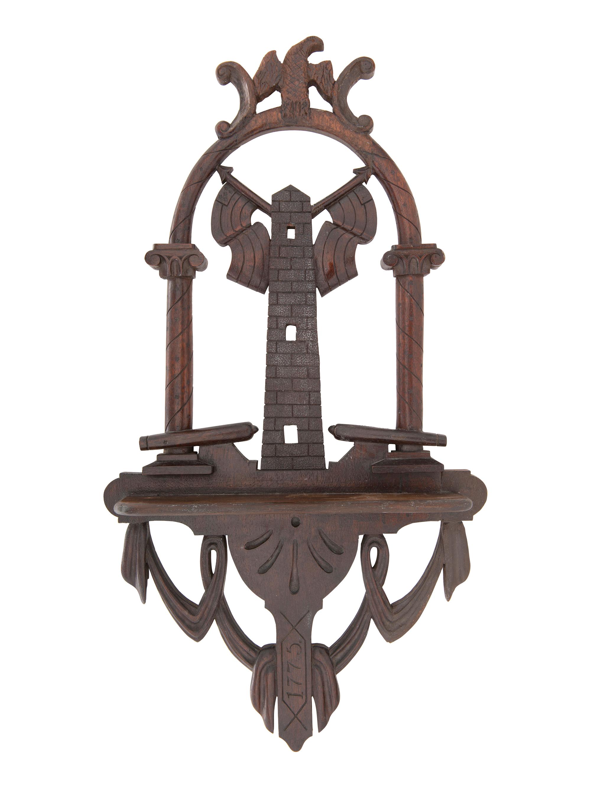 [AMERICANA]. Folk art carved patriotic shelf featuring eagle and cannon.