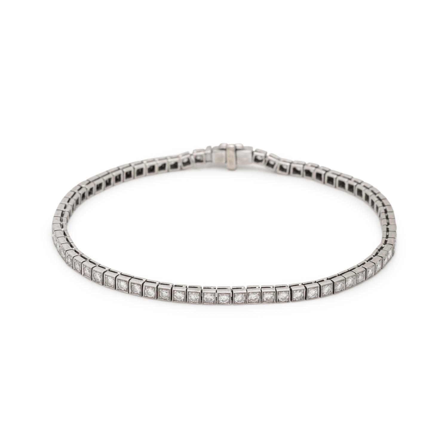 WHITE GOLD AND DIAMOND NECKLACE AND BRACELET