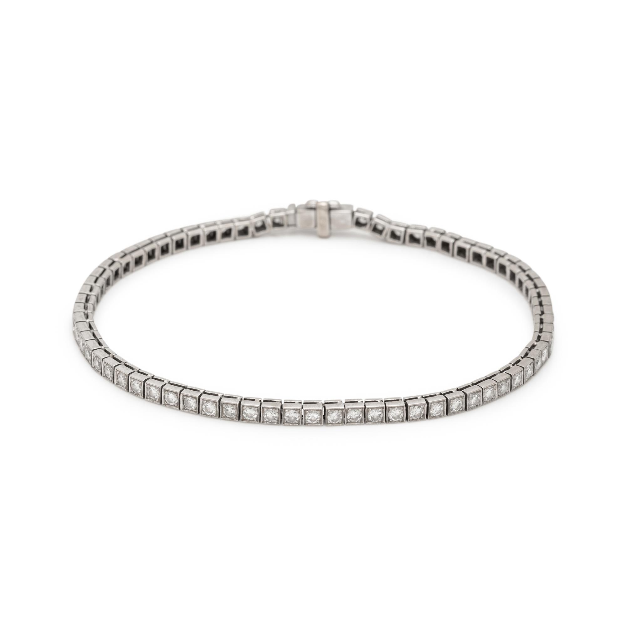 WHITE GOLD AND DIAMOND NECKLACE AND BRACELET