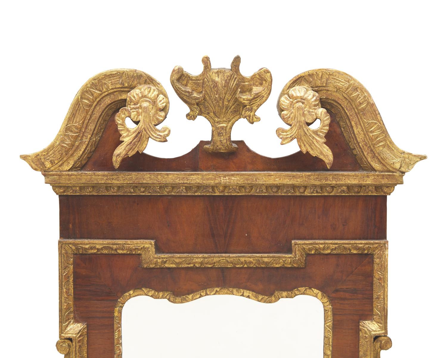 A George III Mahogany Veneered and Parcel-Gilt Looking Glass