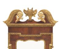 A George III Mahogany Veneered and Parcel-Gilt Looking Glass