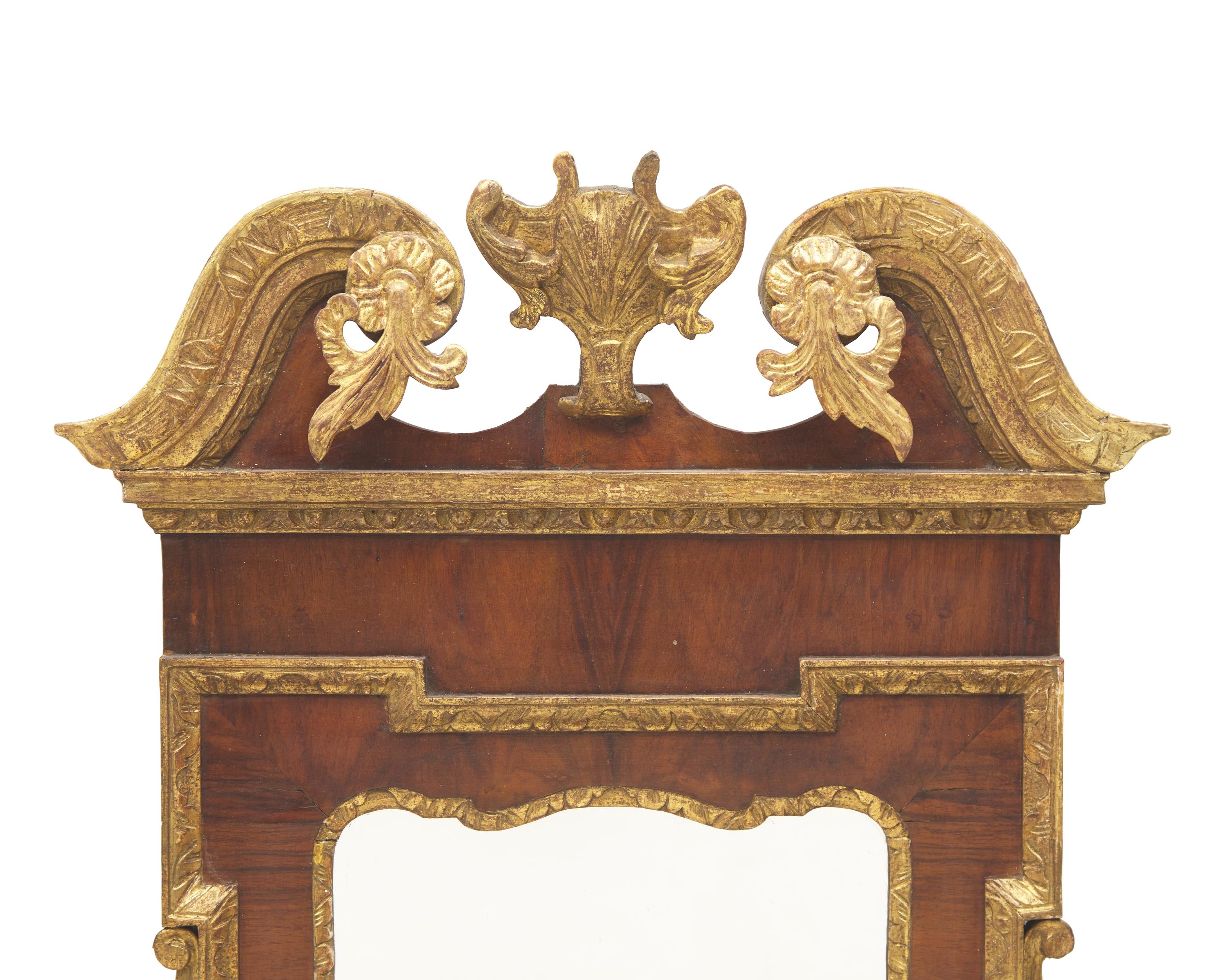 A George III Mahogany Veneered and Parcel-Gilt Looking Glass