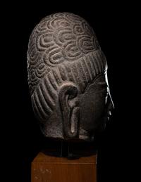 A Khmer Stone Head of Deity