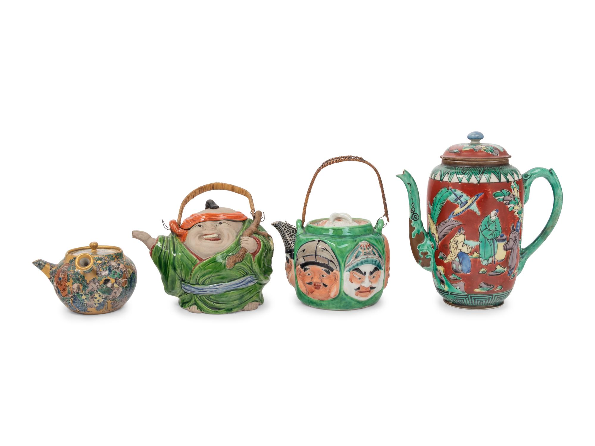 Four Japanese 'Figure' Teapots