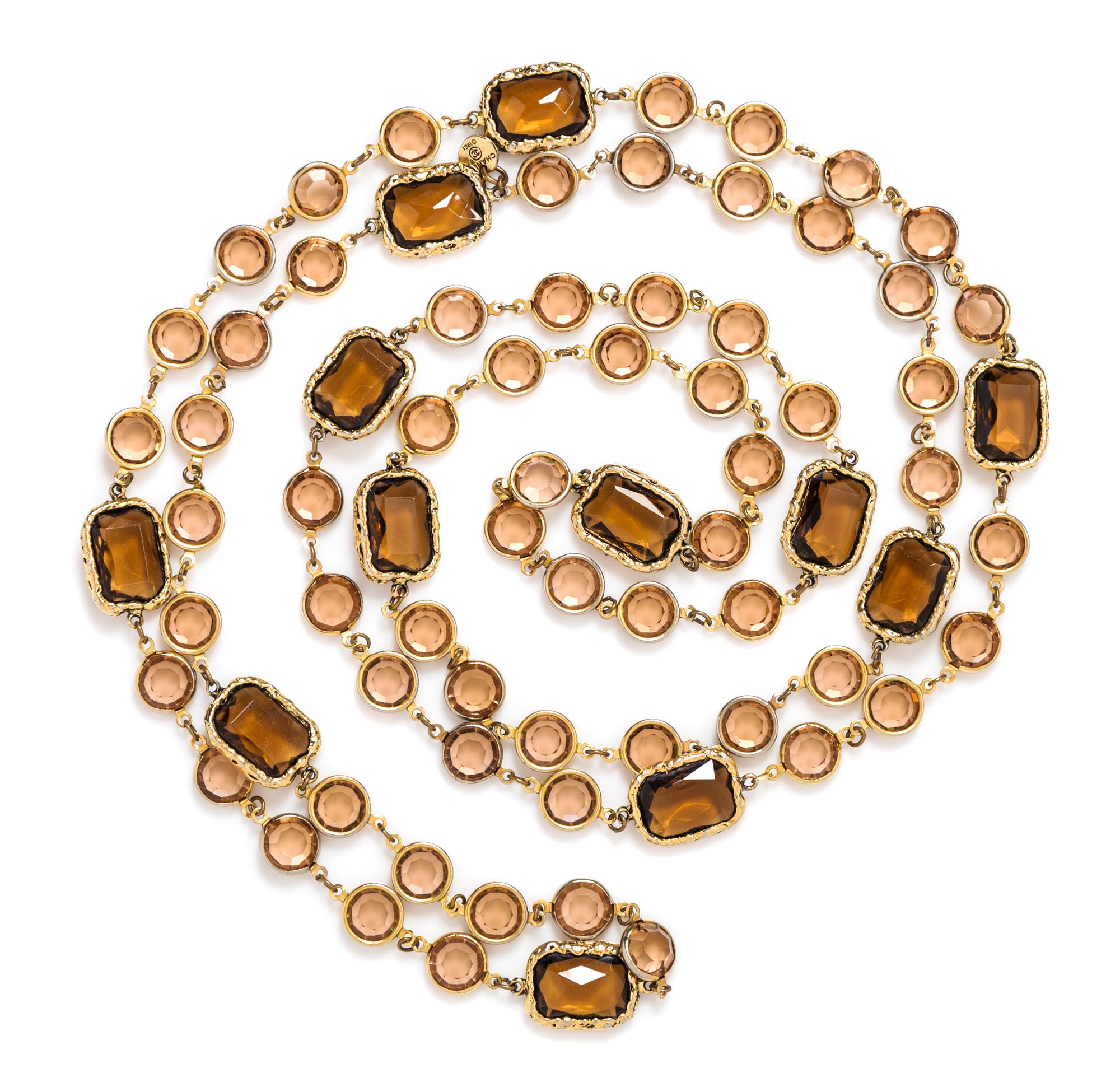 A Chanel Brown Crystal Chicklet Sautoir, 62" long.