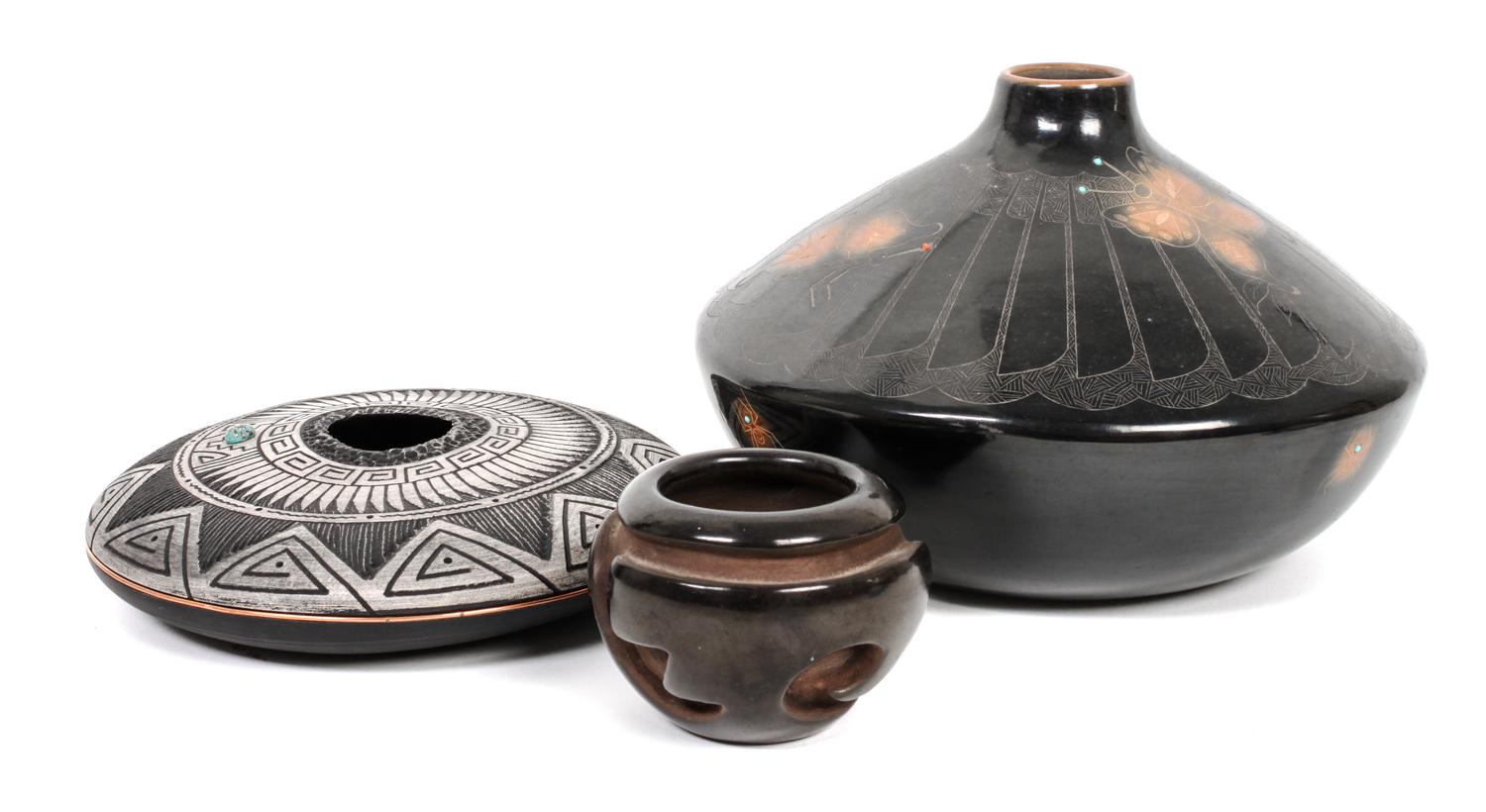 Three Southwestern Pots Height of largest 4 1/2 x diameter 7 1/2 inches.
