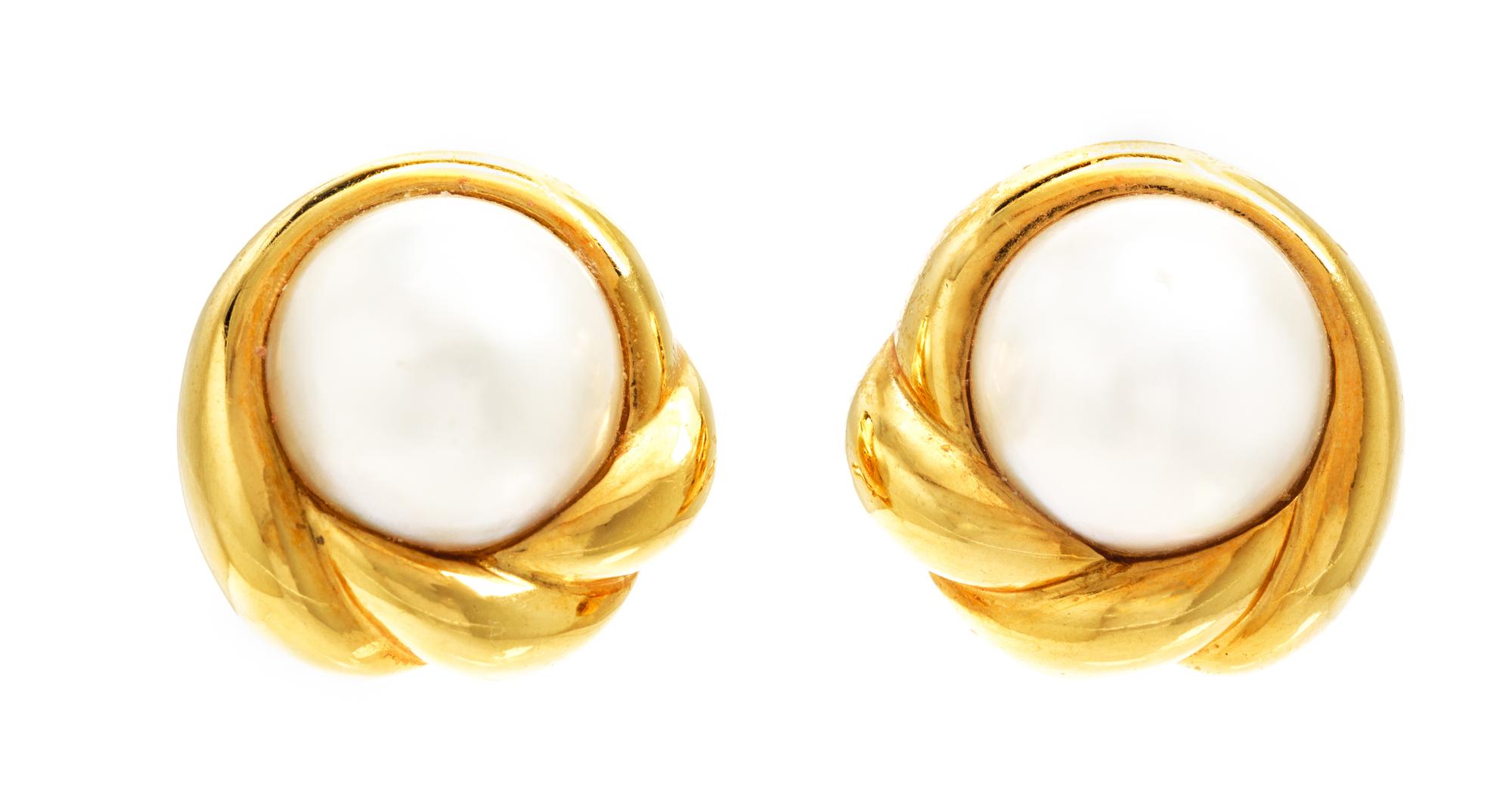 A Pair of 18 Karat Yellow Gold and Mabe Pearl Earclips, 13.30 dwts.