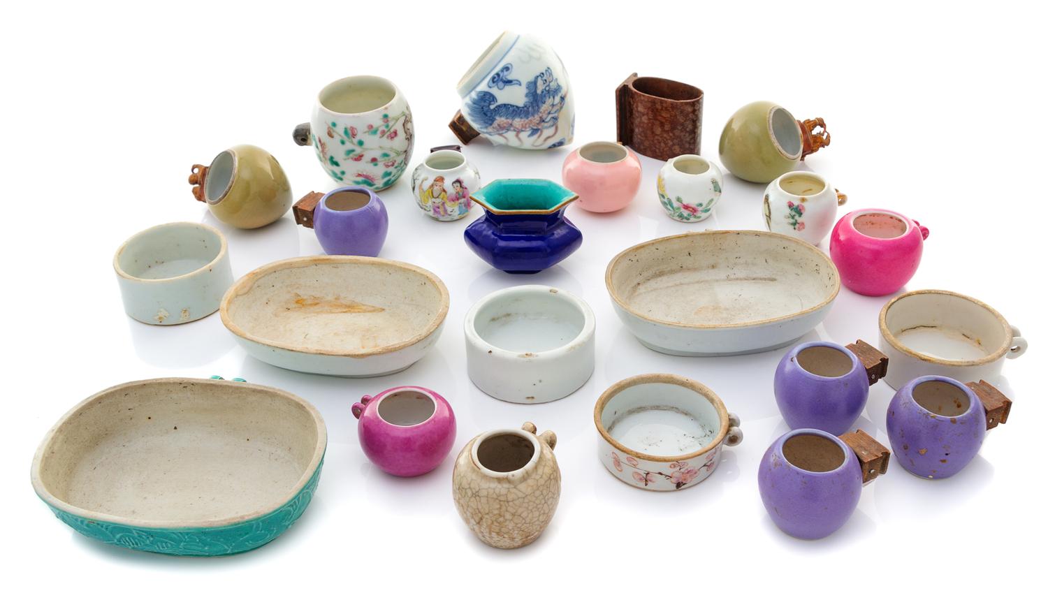 Twenty-Four Chinese Porcelain and Hardwood Bird Feeders Length of largest 4 1/4 inches. — 19TH-EARLY 20TH CENTURY