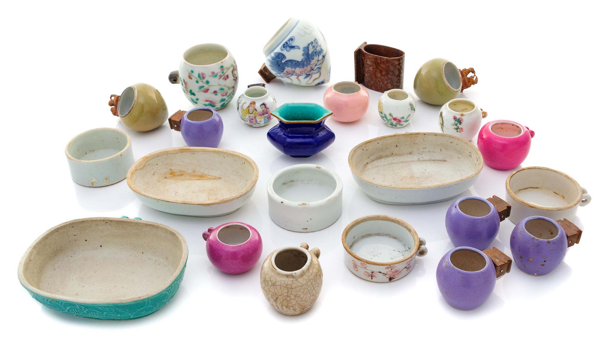 Twenty-Four Chinese Porcelain and Hardwood Bird Feeders Length of largest 4 1/4 inches. — 19TH-EARLY 20TH CENTURY
