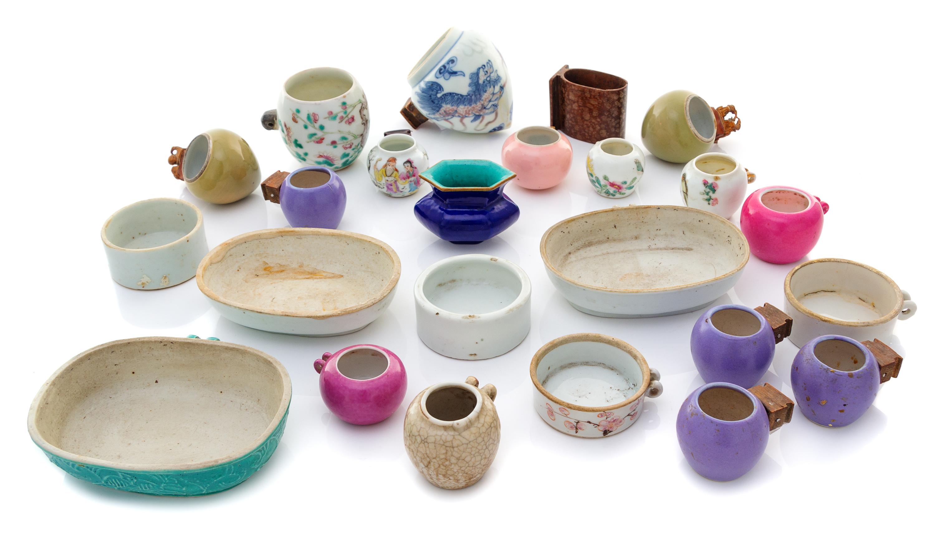 Twenty-Four Chinese Porcelain and Hardwood Bird Feeders Length of largest 4 1/4 inches. — 19TH-EARLY 20TH CENTURY