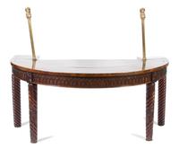 A William IV Style Carved Mahogany and Brass Hunt Board Height 31 1/2 (overall 56) x width 72 x depth 36 inches. — 19TH CENTURY