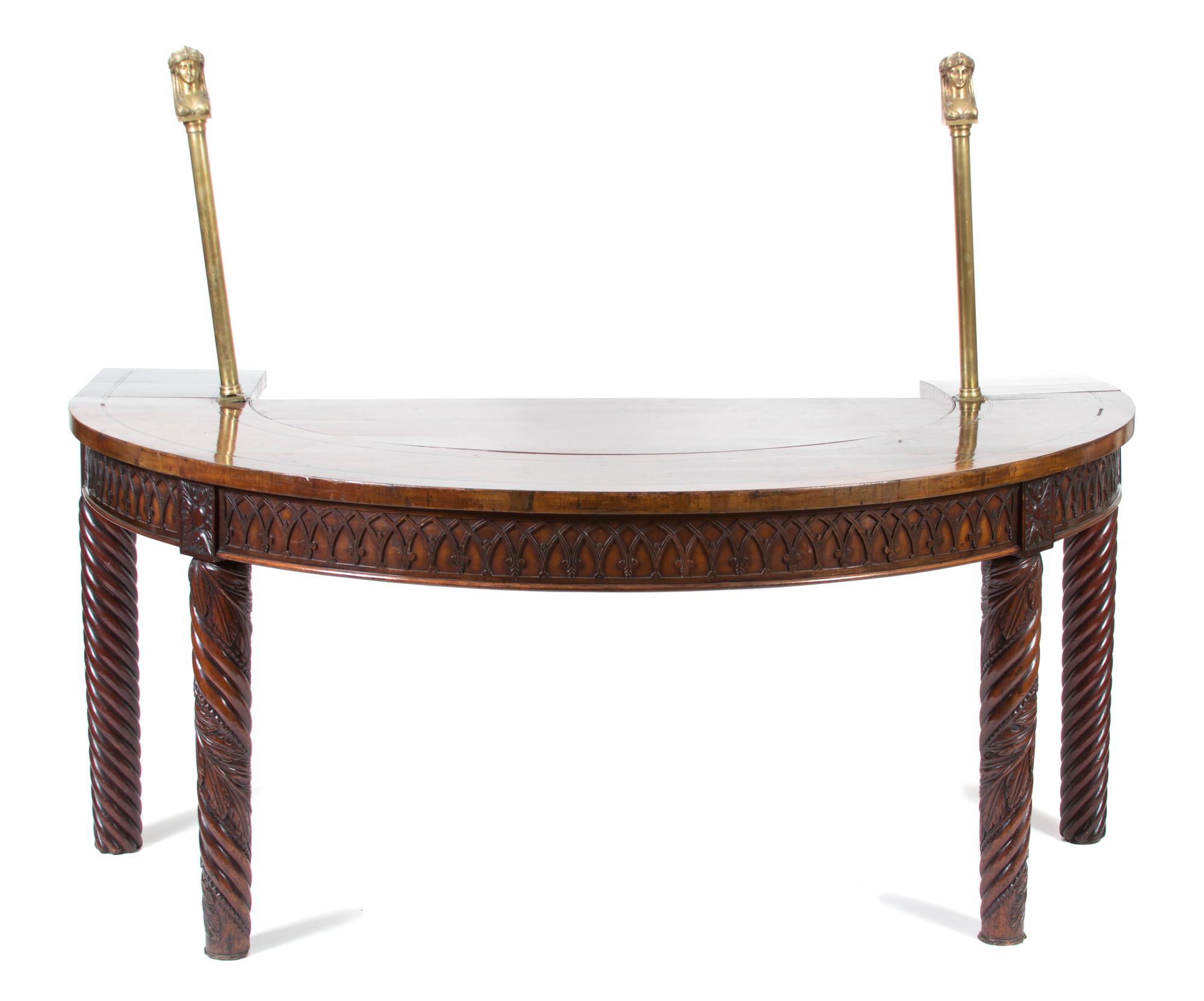 A William IV Style Carved Mahogany and Brass Hunt Board Height 31 1/2 (overall 56) x width 72 x depth 36 inches. — 19TH CENTURY