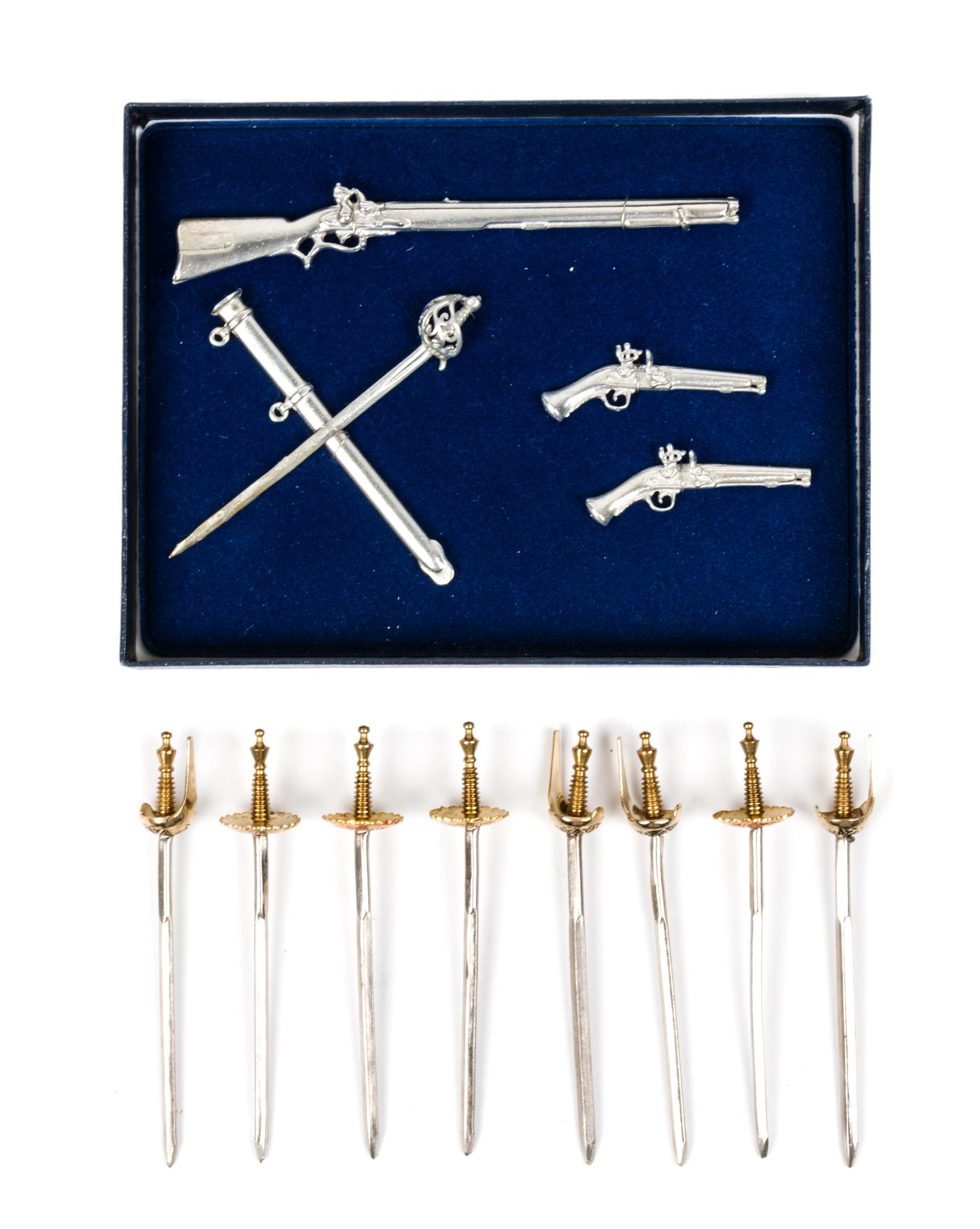 A Collection of Metal Arms Length of longest 4 1/4 inches. — Various Makers