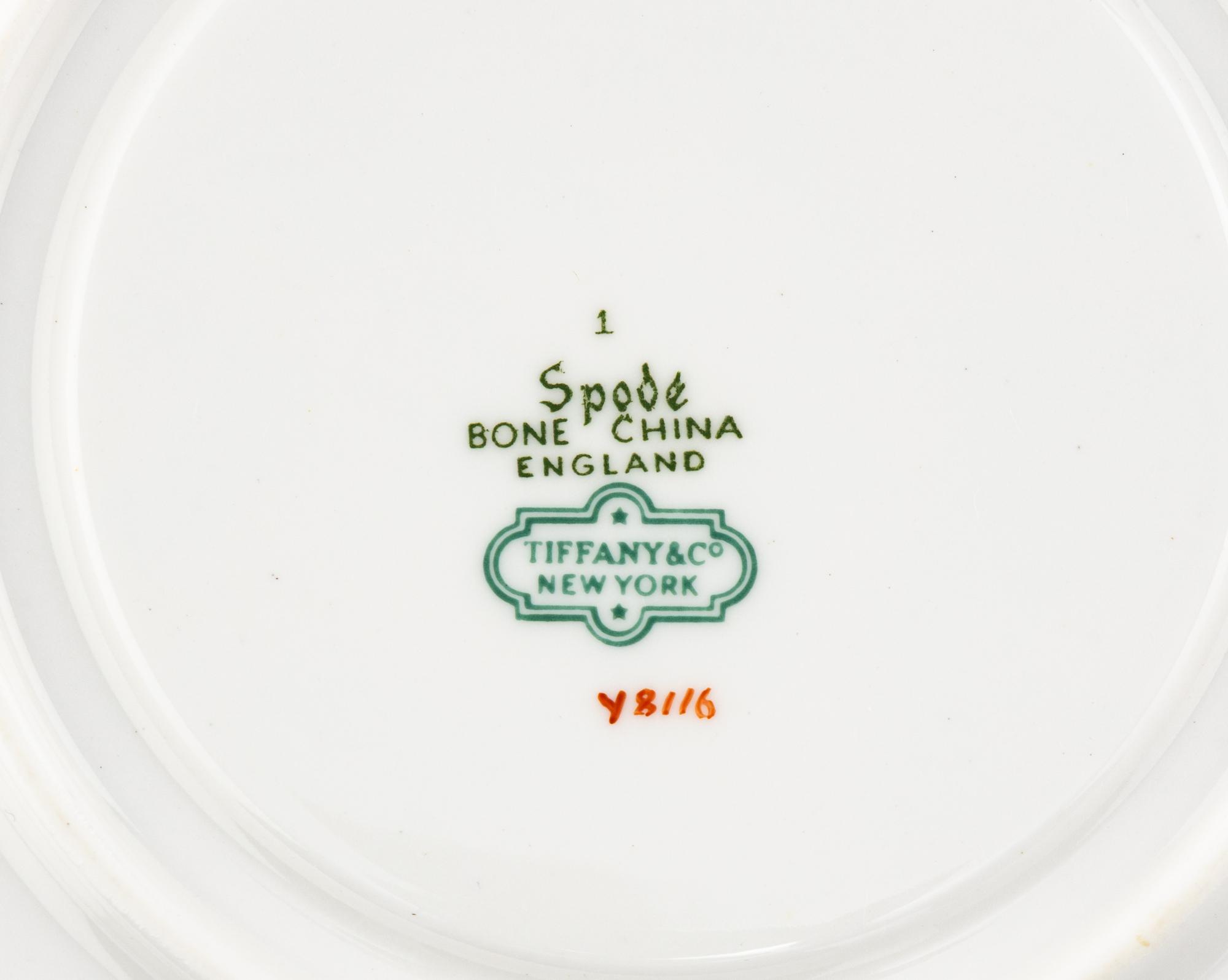 A Spode Porcelain Dinner Service for Fifteen in the Floral Armorial Pattern