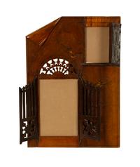 An Art Nouveau Intarsia Wood Peekaboo Frame