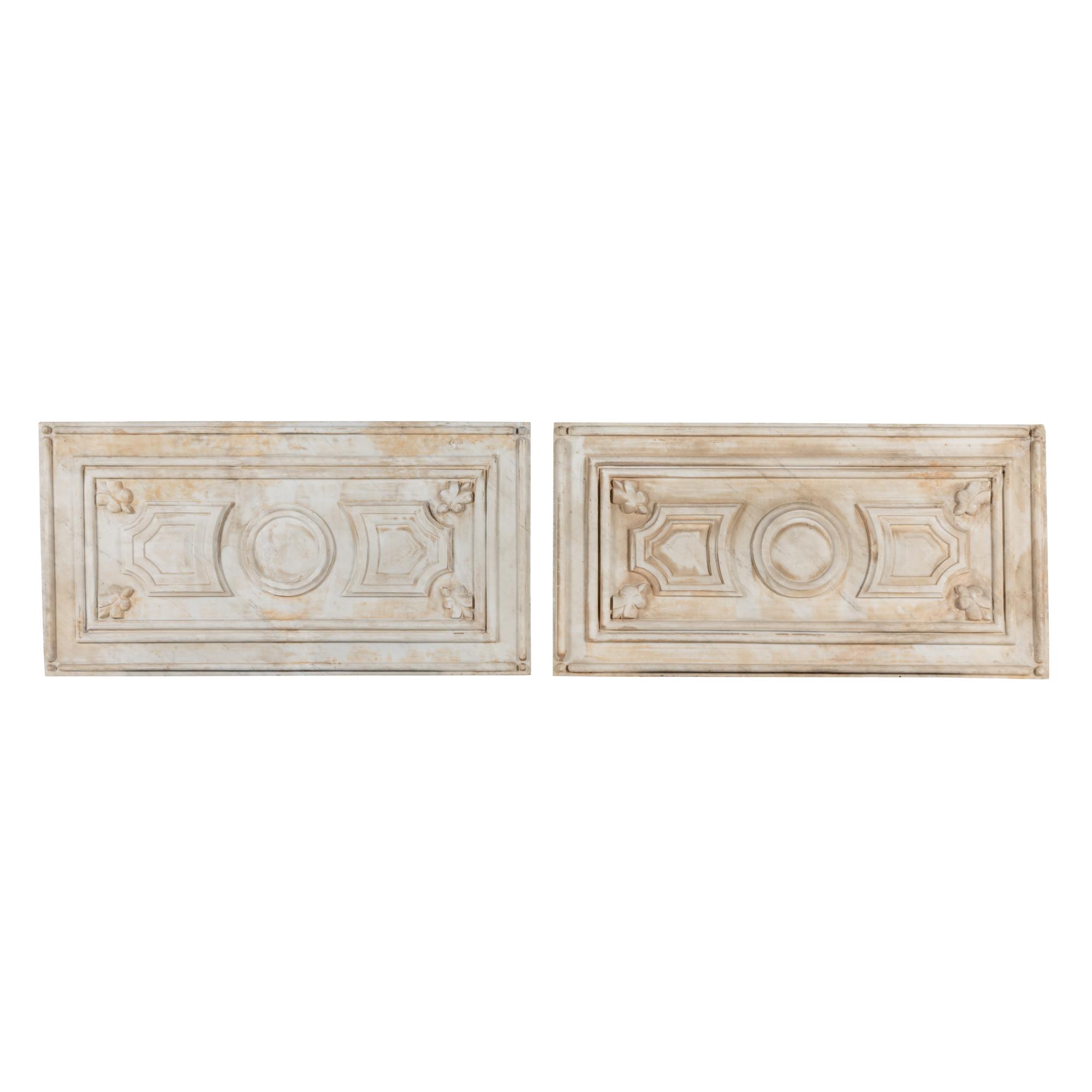 A Pair of Italian Carved Marble Plaques