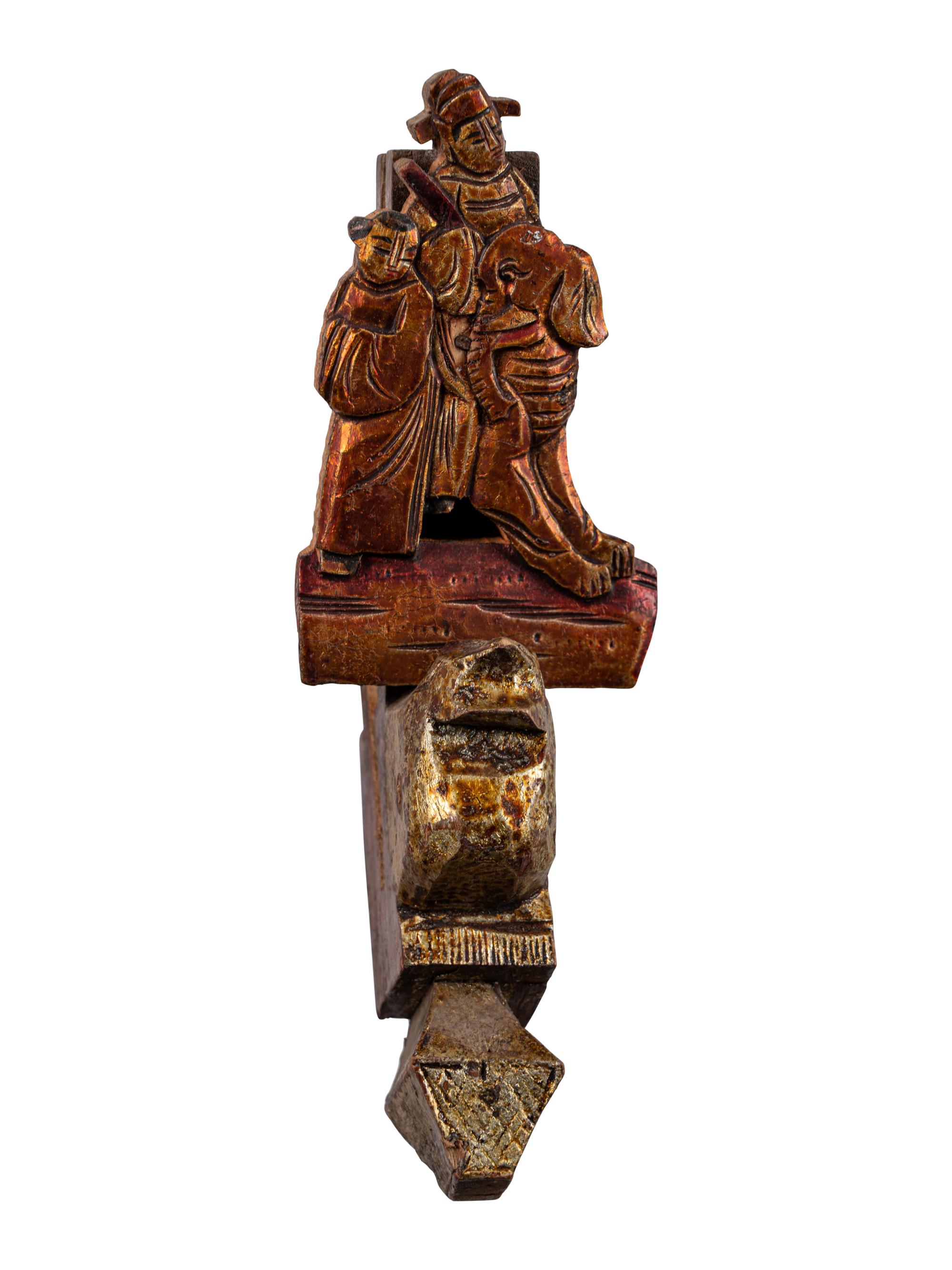 A Group of Chinese Gilt and Red Lacquered Wood Fragments