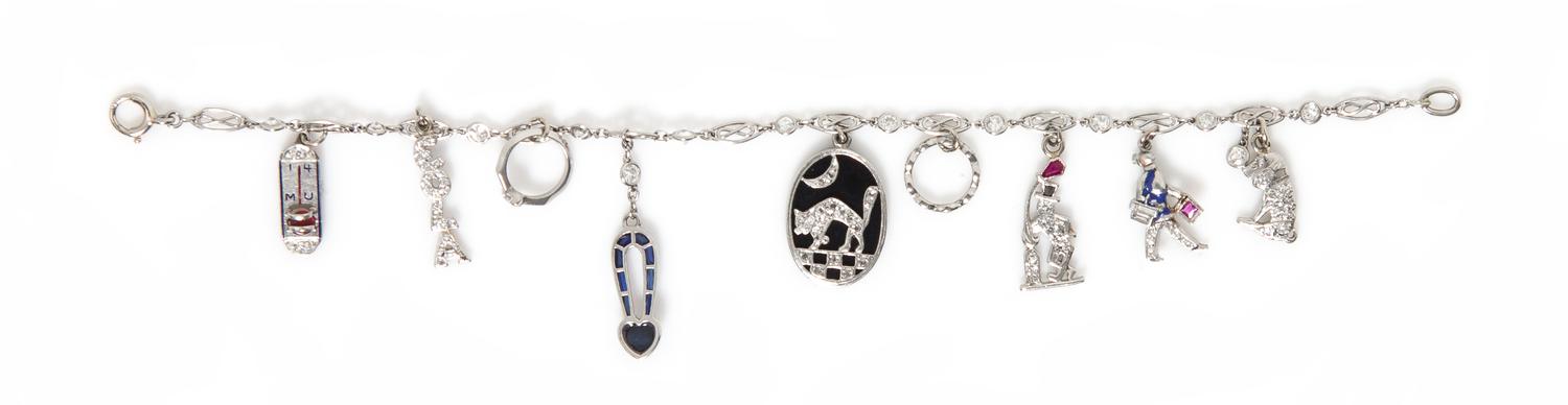 An Art Deco Platinum and Diamond Charm Bracelet, 8.40 dwts.