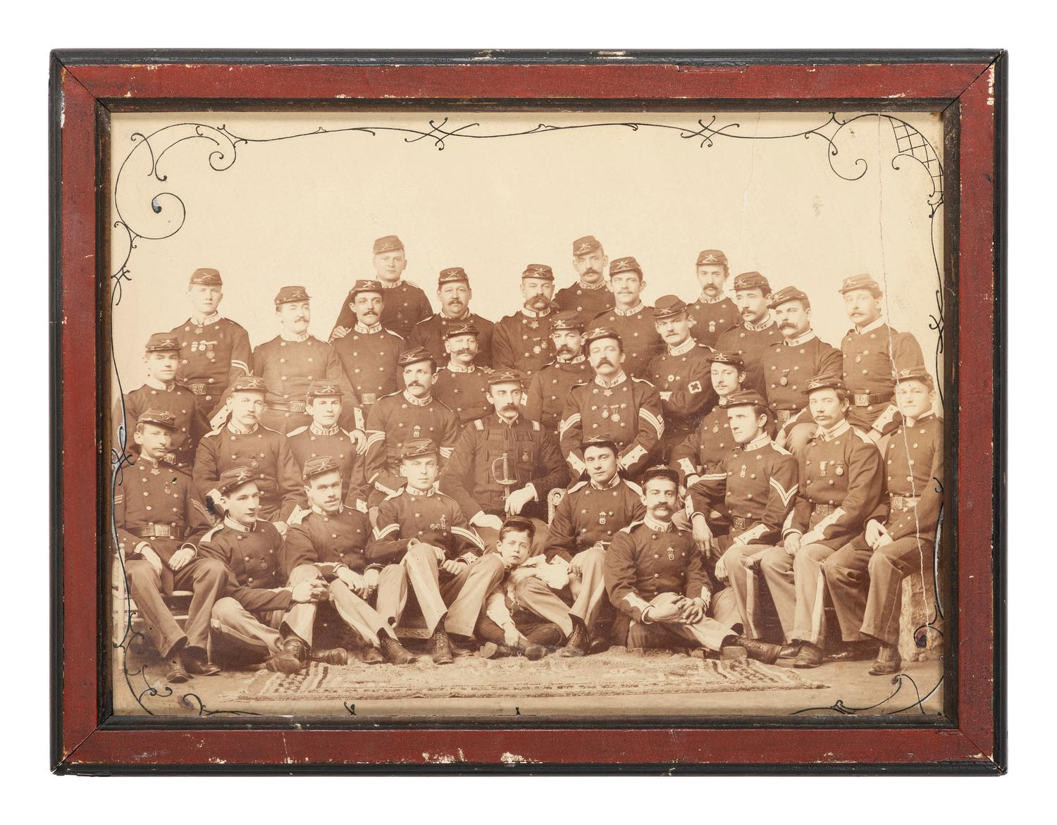 [LATE INDIAN WARS]. Studio portrait of Company E, 9th New York National Guard or Militia. [New York?]: ca 1885-1900.