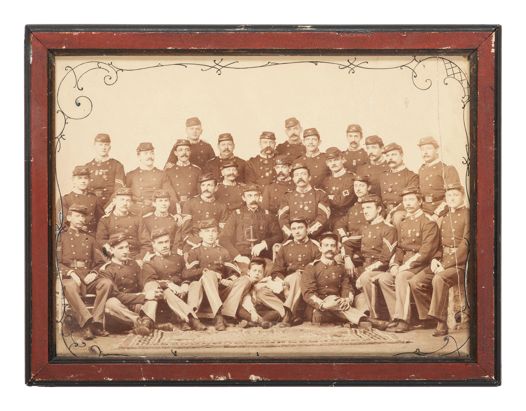 [LATE INDIAN WARS]. Studio portrait of Company E, 9th New York National Guard or Militia. [New York?]: ca 1885-1900.