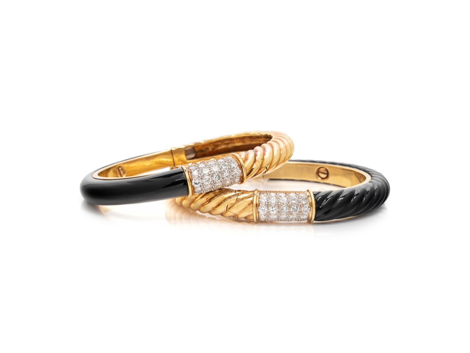 PAIR OF YELLOW GOLD, DIAMOND AND ONYX BANGLE BRACELETS