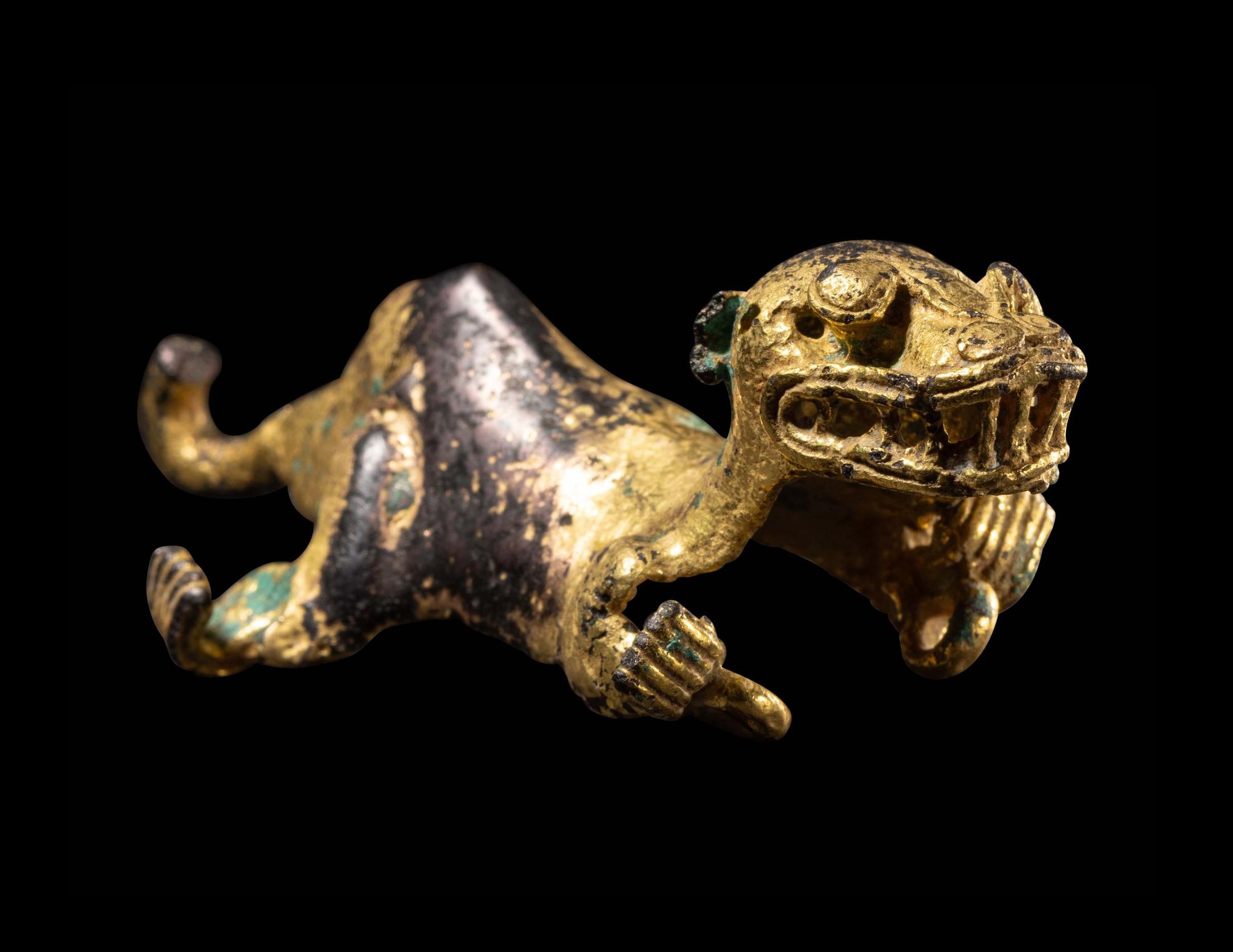 A Diquis Gold-Plated Feline Pendant