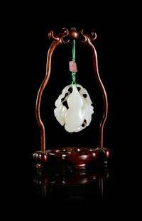 A White Jade 'Gourd' Pendant