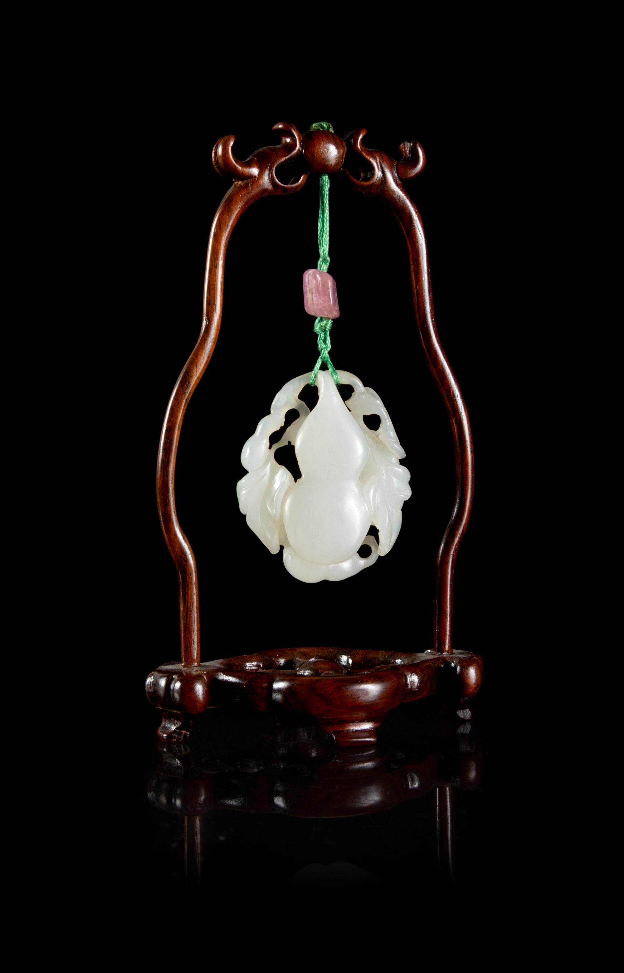 A White Jade 'Gourd' Pendant