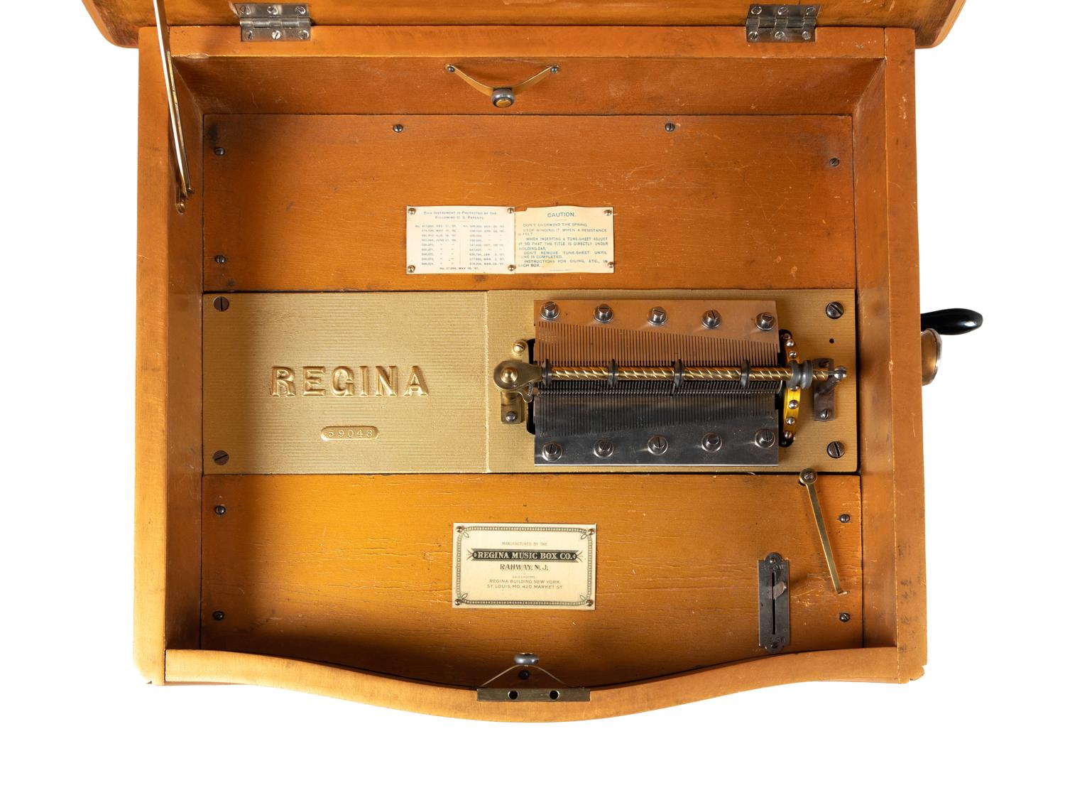 A Regina Style 40 15 1/2 inch Disk Music Box