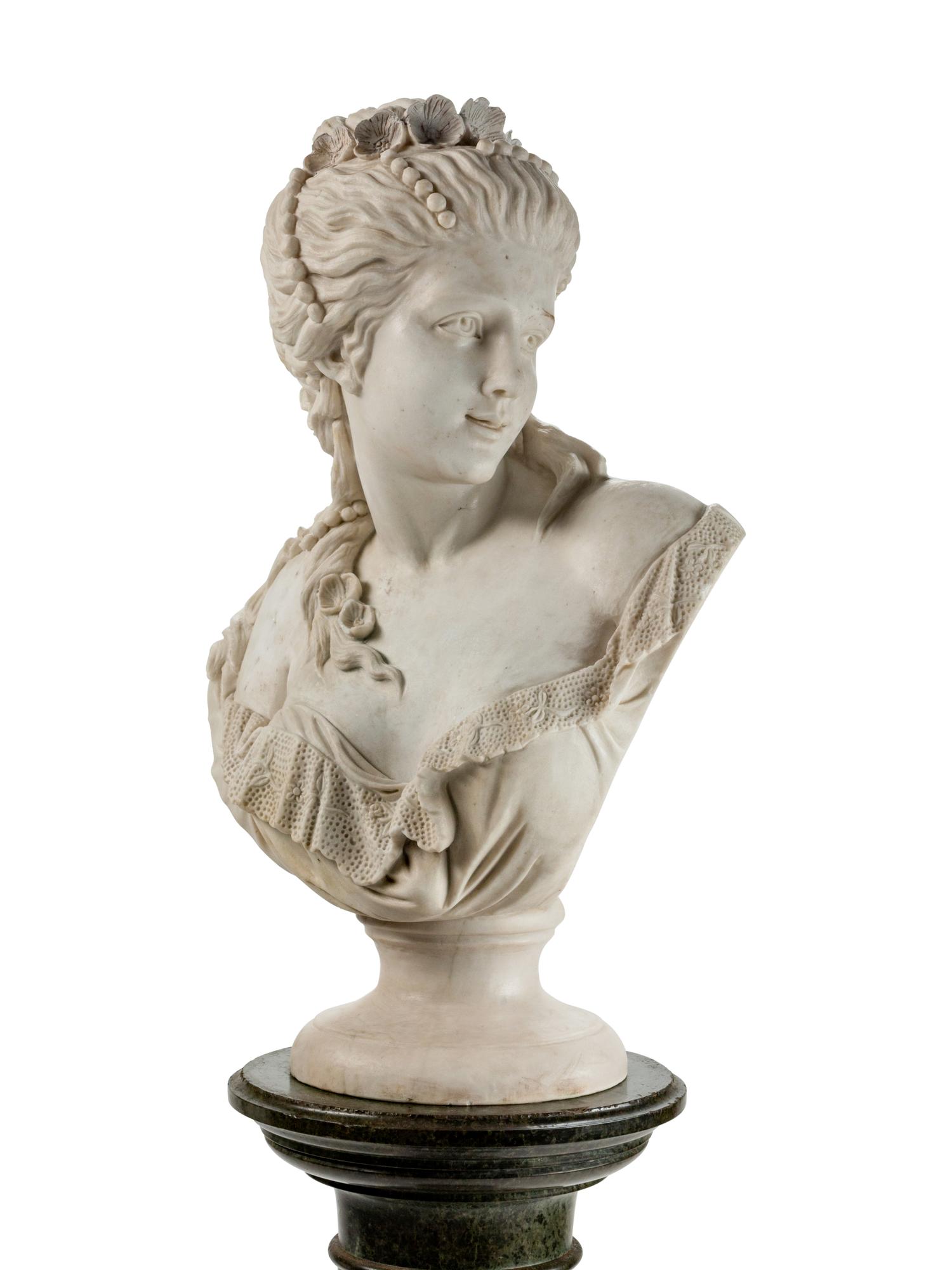 An Italian Carved Marble Bust of a Woman