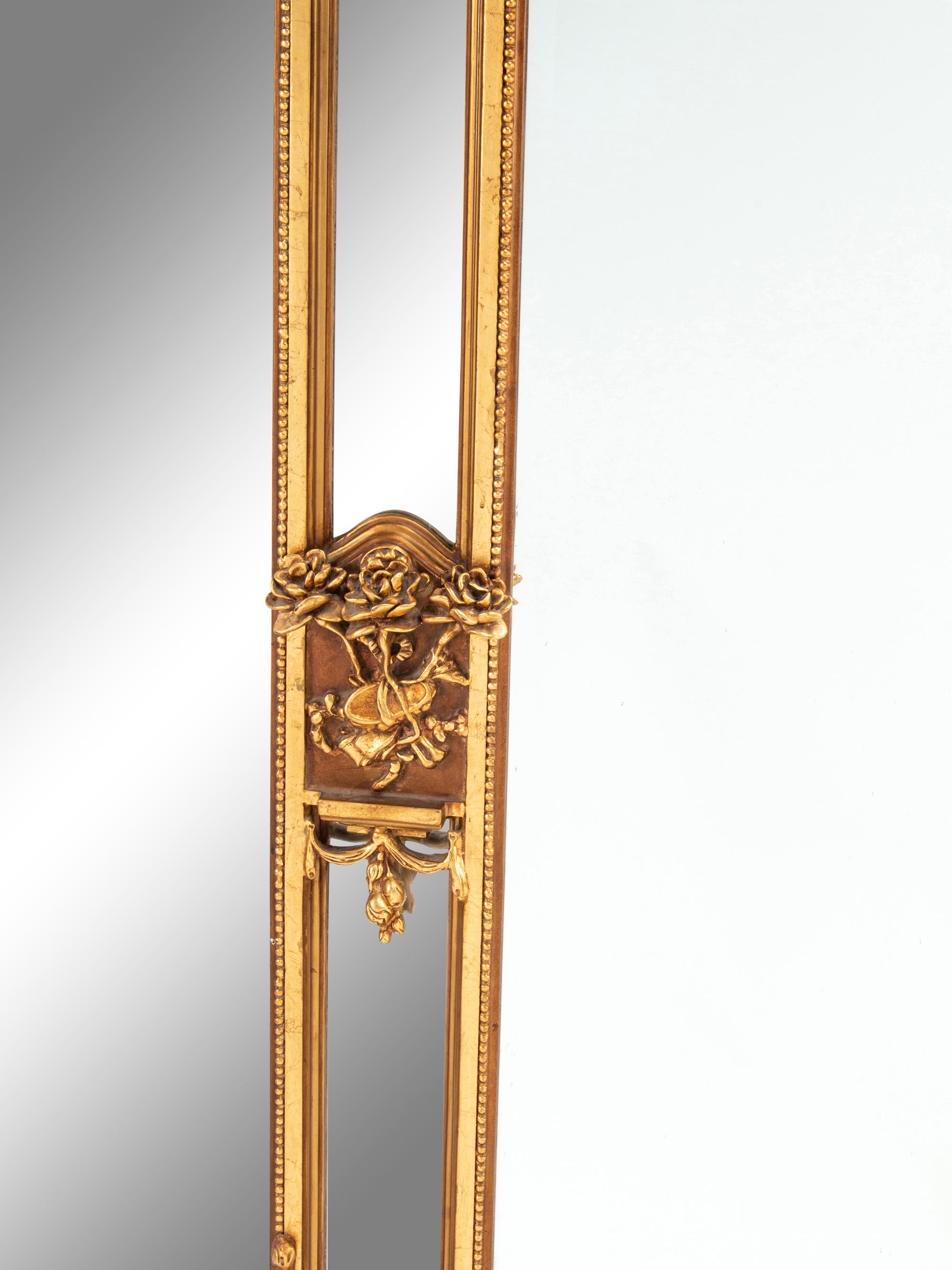 A Pair of Louis XVI Style Gilded Mirrors