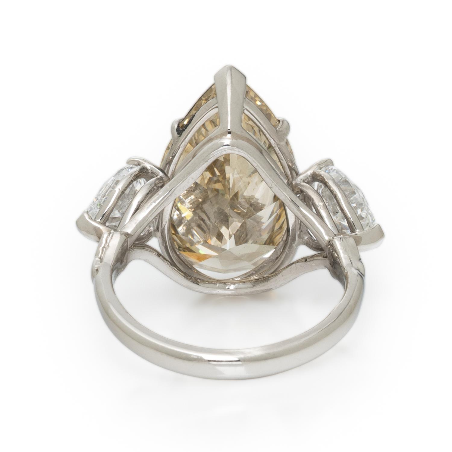 NATURAL FANCY BROWNISH YELLOW PEAR SHAPED DIAMOND AND DIAMOND RING