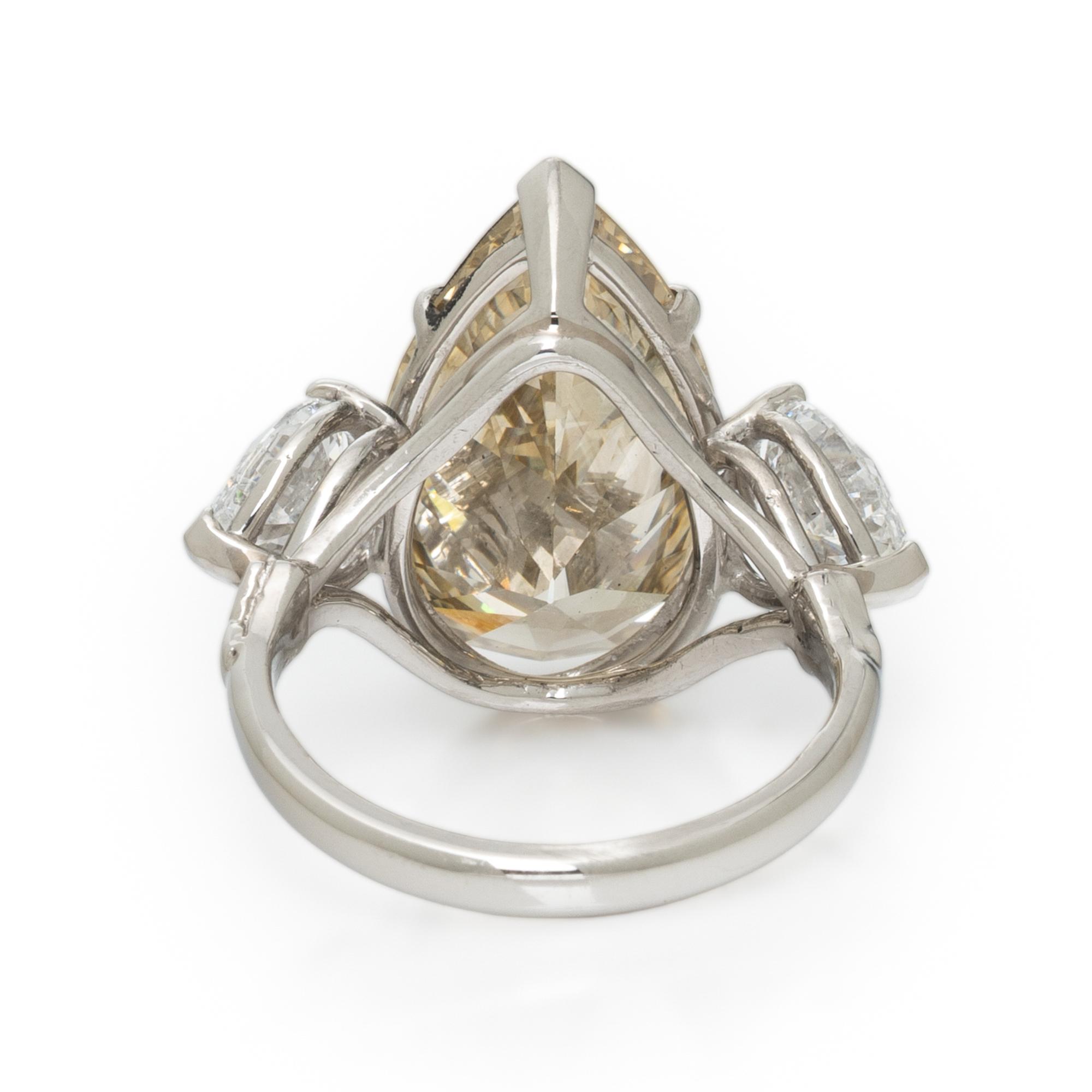 NATURAL FANCY BROWNISH YELLOW PEAR SHAPED DIAMOND AND DIAMOND RING