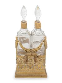 A French Gilt Metal and Glass Four-Bottle Decanter Caddy
