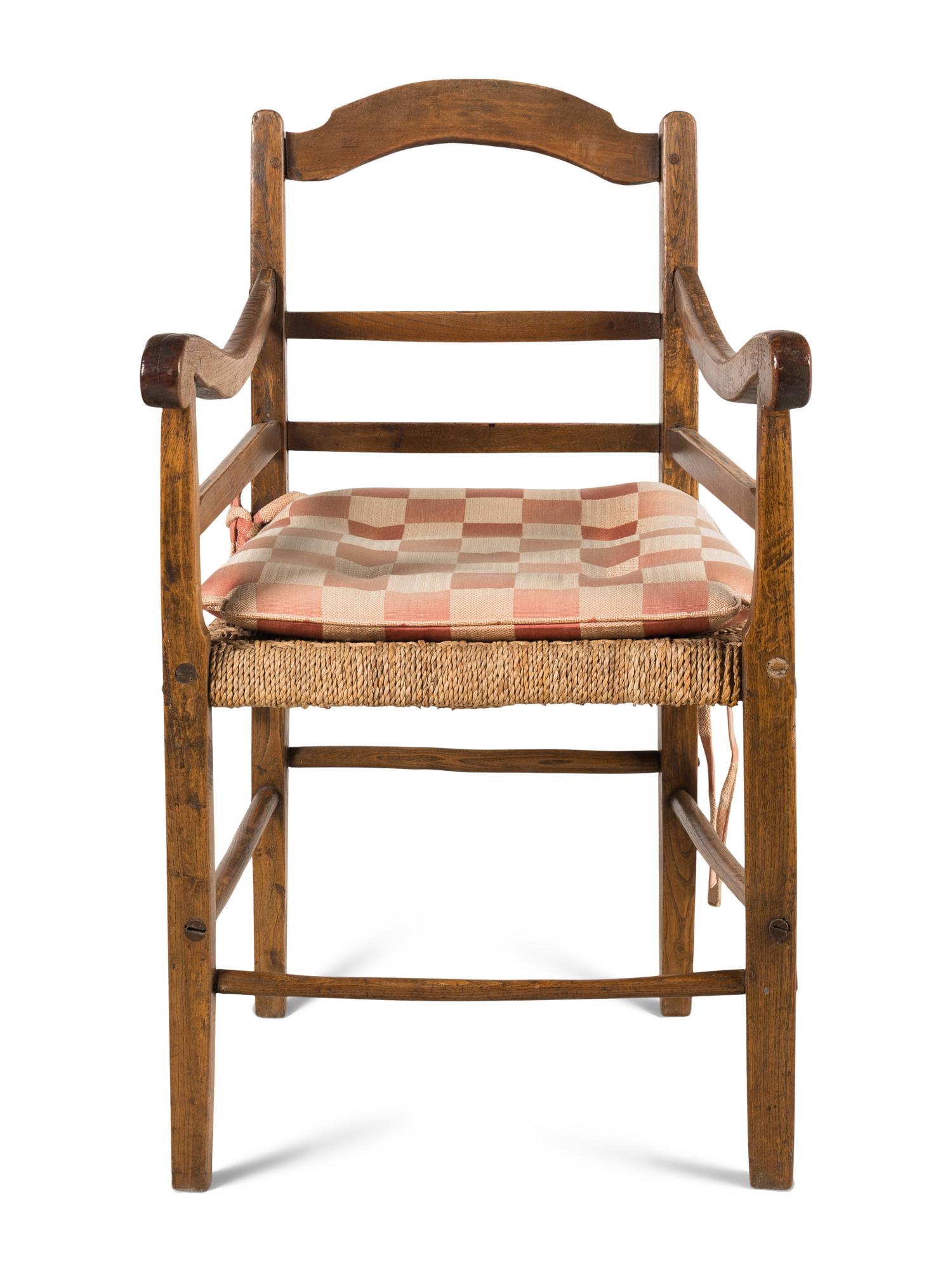 A Ladderback Oak and Rush Seat Armchair