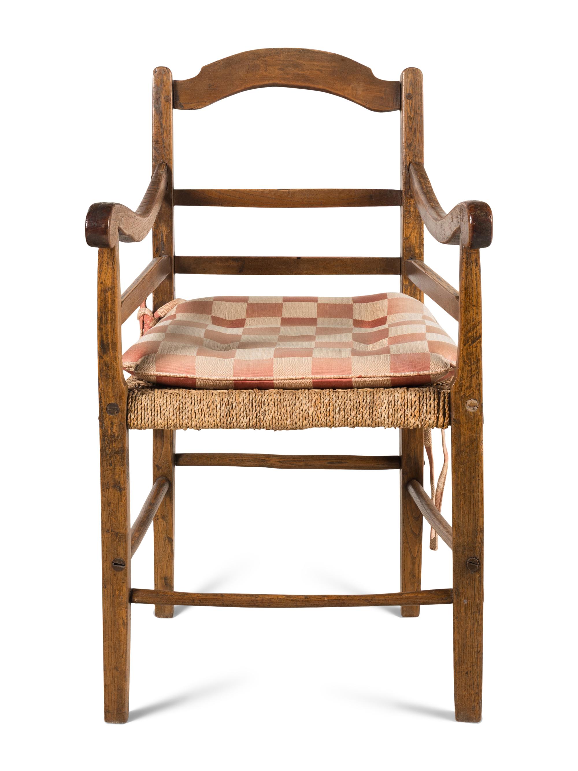 A Ladderback Oak and Rush Seat Armchair