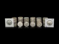 A Collection of Benjamin Franklin and John F. Kennedy 50 coins