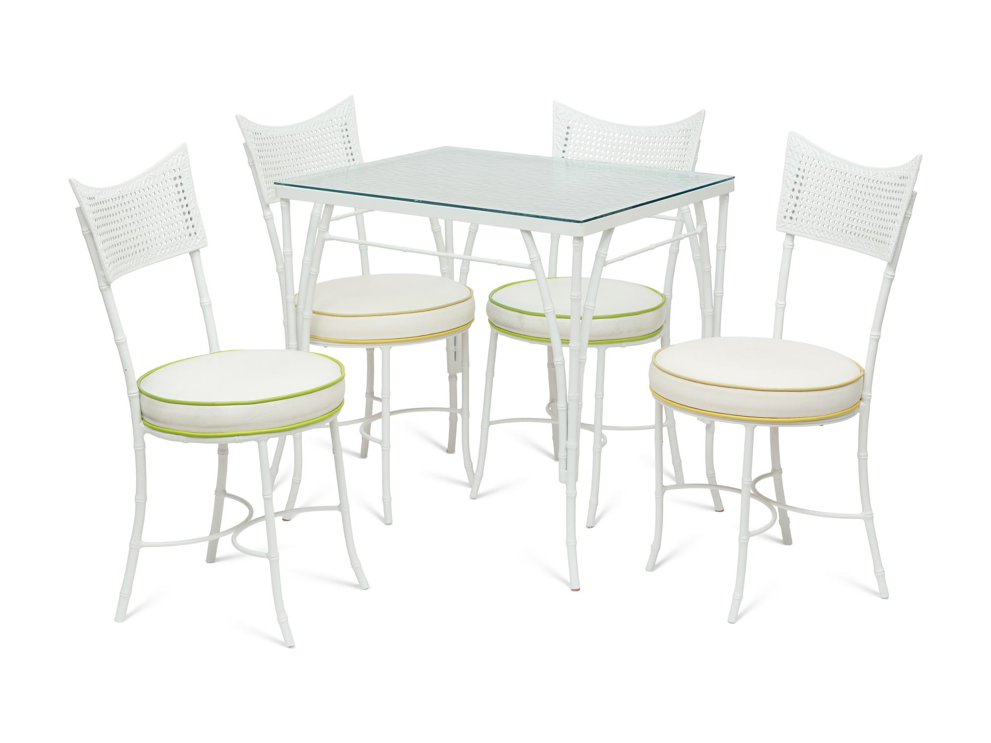 A Powder-Coated Metal Five-Piece Garden Table and Chairs