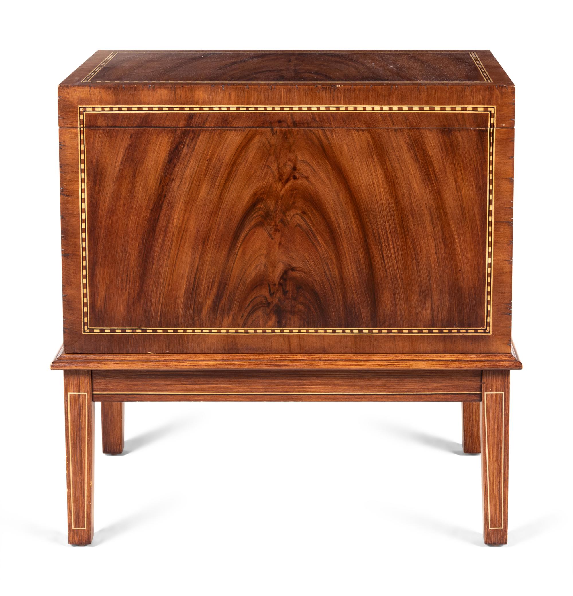 A Georgian Style Mahogany Lift-Top Cabinet Fitted with a Tray Table