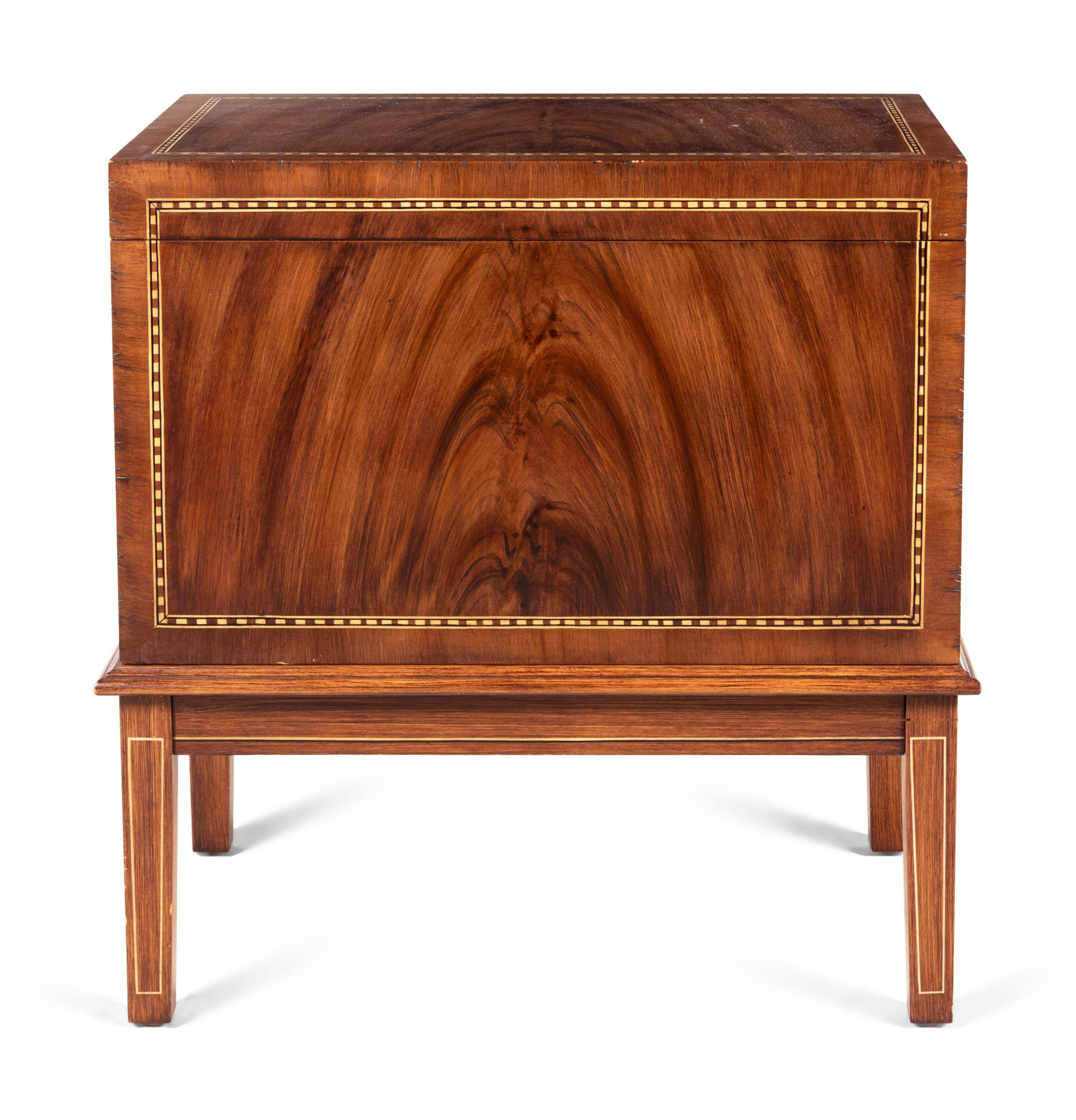A Georgian Style Mahogany Lift-Top Cabinet Fitted with a Tray Table