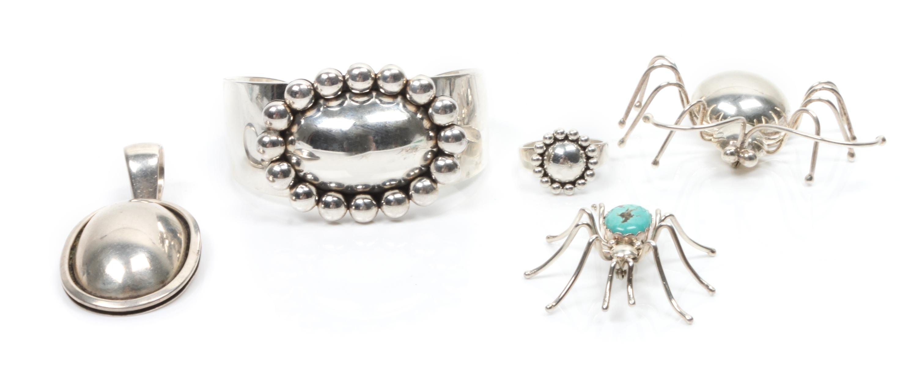 Four Pieces of Navajo Silver Jewelry, Artie Yellowhorse Cuff length 6 1/3 plus opening 1 x width 1 3/8 inches.